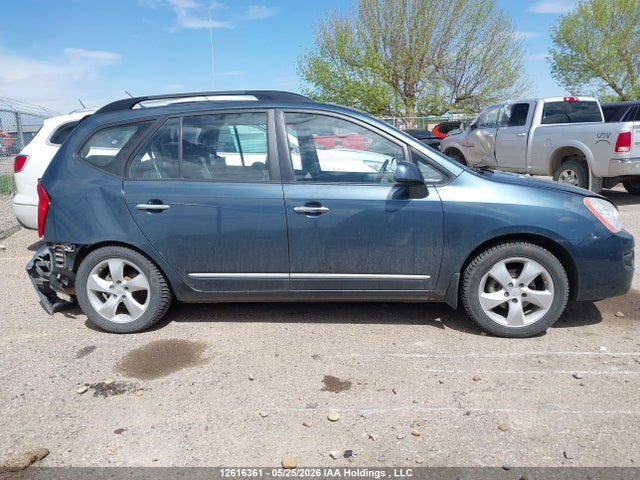 12616361 :رقم المزاد ، KNAFG528597229944 vin ، 2009 Kia Rondo Lx/ex مزاد بيع