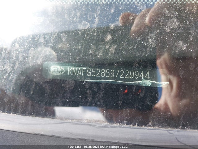 12616361 :رقم المزاد ، KNAFG528597229944 vin ، 2009 Kia Rondo Lx/ex مزاد بيع