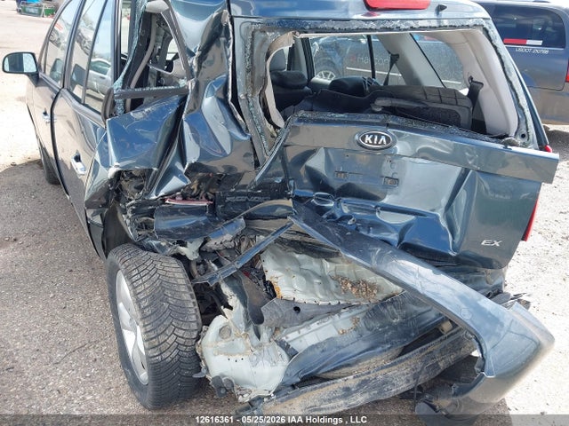 12616361 :رقم المزاد ، KNAFG528597229944 vin ، 2009 Kia Rondo Lx/ex مزاد بيع