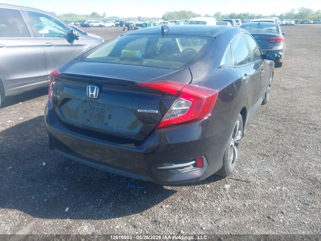 2016 Honda Civic Touring მანქანა იყიდება აუქციონზე, vin: 2HGFC1F94GH105712, აუქციონის ნომერი: 12616903