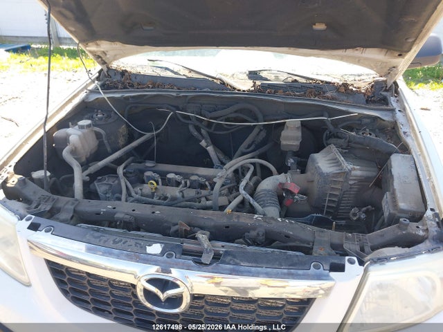 12617498 :رقم المزاد ، 4F2CY0C78BKM04167 vin ، 2011 Mazda Tribute مزاد بيع