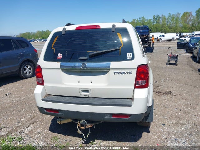 12617498 :رقم المزاد ، 4F2CY0C78BKM04167 vin ، 2011 Mazda Tribute مزاد بيع