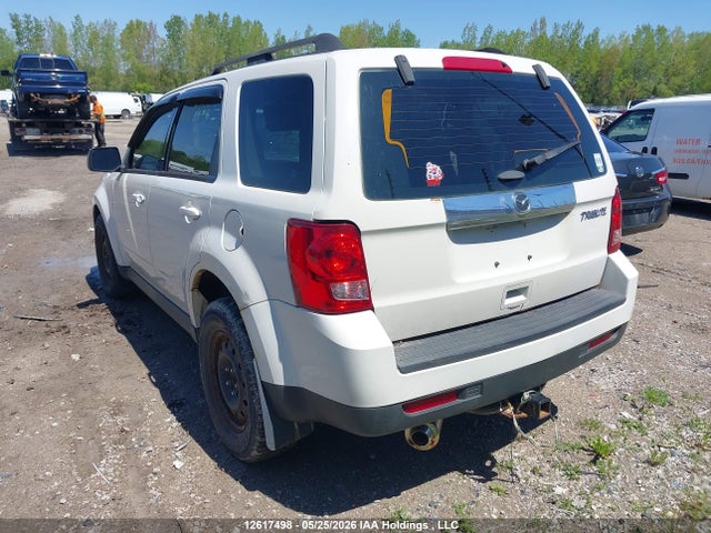 12617498 :رقم المزاد ، 4F2CY0C78BKM04167 vin ، 2011 Mazda Tribute مزاد بيع