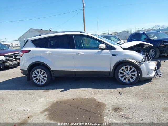 Продажа на аукционе авто 2017 Ford Escape Titanium, vin: 1FMCU9J97HUE40400, номер лота: 12600396