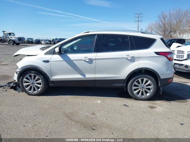 Продажа на аукционе авто 2017 Ford Escape Titanium, vin: 1FMCU9J97HUE40400, номер лота: 12600396