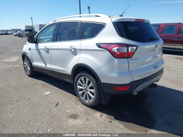 Продажа на аукционе авто 2017 Ford Escape Titanium, vin: 1FMCU9J97HUE40400, номер лота: 12600396