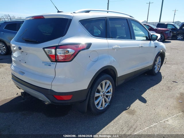 Продажа на аукционе авто 2017 Ford Escape Titanium, vin: 1FMCU9J97HUE40400, номер лота: 12600396