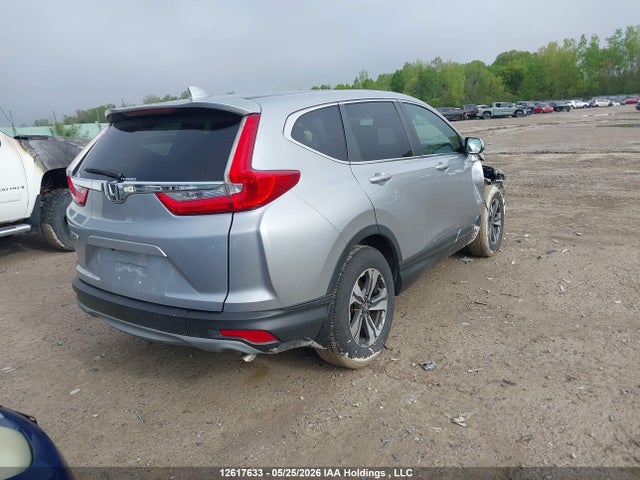 12617633 :رقم المزاد ، 2HKRW1H31HH001313 vin ، 2017 Honda Cr-v مزاد بيع