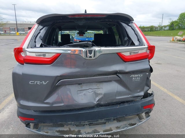 12617884 :رقم المزاد ، 2HKRW2H21JH143437 vin ، 2018 Honda Cr-v مزاد بيع