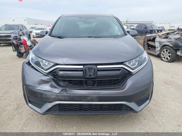 12618211 :رقم المزاد ، 2HKRW2H25MH212411 vin ، 2021 Honda Cr-v Lx مزاد بيع