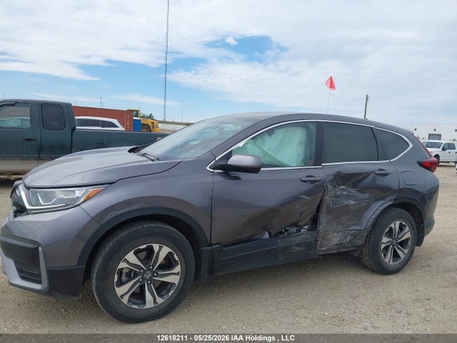 12618211 :رقم المزاد ، 2HKRW2H25MH212411 vin ، 2021 Honda Cr-v Lx مزاد بيع