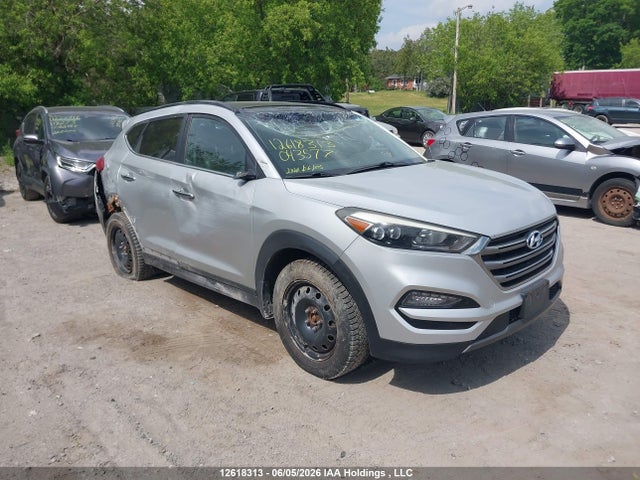 KM8J3CA2XGU043577 Hyundai Tucson