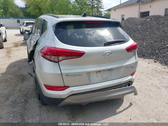 KM8J3CA2XGU043577 Hyundai Tucson