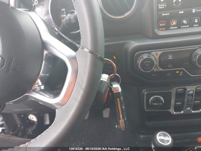 12618326 :رقم المزاد ، 1C4JJXP68PW670097 vin ، 2023 Jeep Wrangler 4xe Unlimited Sahara مزاد بيع