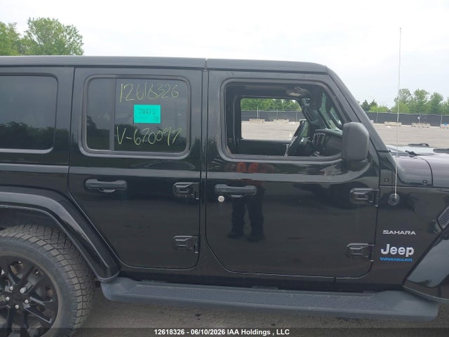 12618326 :رقم المزاد ، 1C4JJXP68PW670097 vin ، 2023 Jeep Wrangler 4xe Unlimited Sahara مزاد بيع