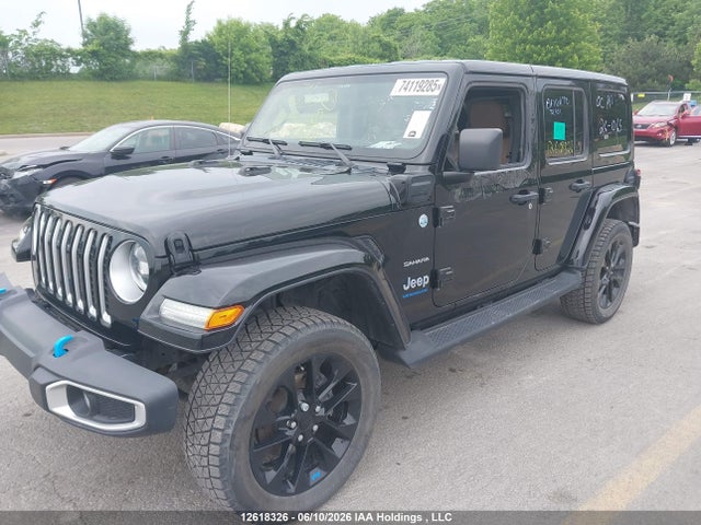 12618326 :رقم المزاد ، 1C4JJXP68PW670097 vin ، 2023 Jeep Wrangler 4xe Unlimited Sahara مزاد بيع
