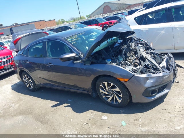 Auction sale of the 2018 Honda Civic Lx, vin: 2HGFC2F62JH041642, lot number: 12618888