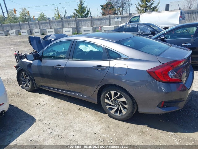 Auction sale of the 2018 Honda Civic Lx, vin: 2HGFC2F62JH041642, lot number: 12618888