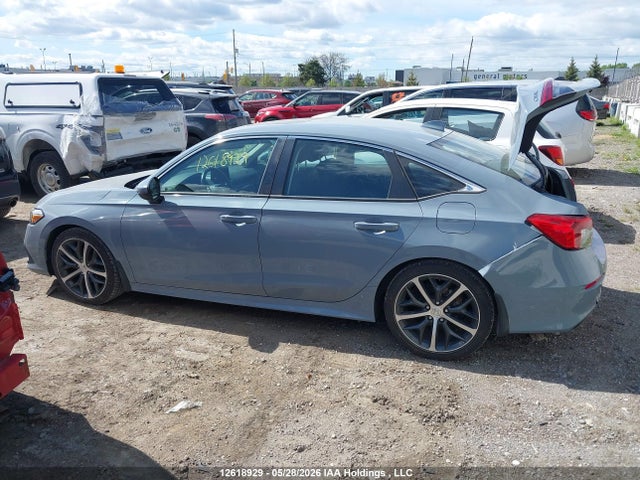 2HGFE1F93PH000752 Honda Civic Touring