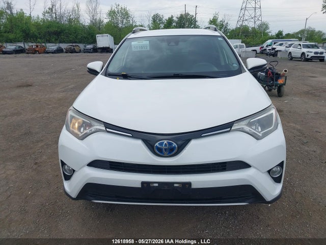 12618958 :رقم المزاد ، JTMRJREV1JD243680 vin ، 2018 Toyota Rav4 Hybrid Le+ مزاد بيع