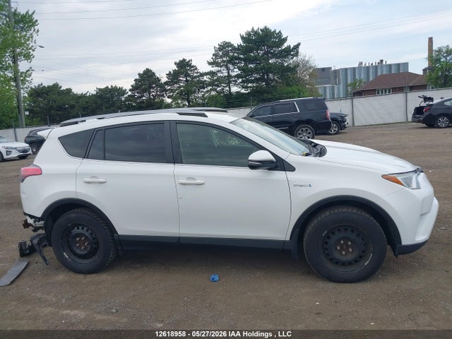 12618958 :رقم المزاد ، JTMRJREV1JD243680 vin ، 2018 Toyota Rav4 Hybrid Le+ مزاد بيع