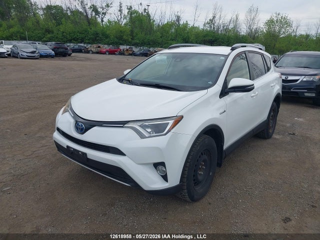 12618958 :رقم المزاد ، JTMRJREV1JD243680 vin ، 2018 Toyota Rav4 Hybrid Le+ مزاد بيع
