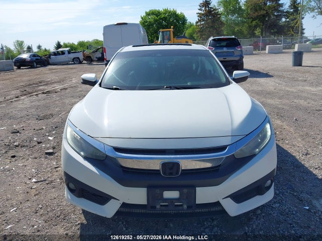 2016 Honda Civic Touring მანქანა იყიდება აუქციონზე, vin: 2HGFC1F93GH104762, აუქციონის ნომერი: 12619252