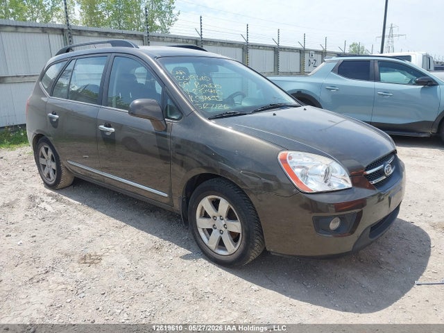 12619610 :رقم المزاد ، KNAFG528597239440 vin ، 2009 Kia Rondo Lx/ex مزاد بيع