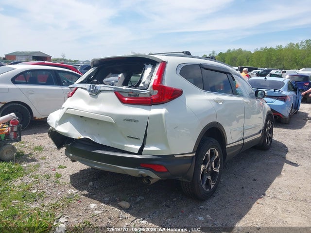 2018 Honda Cr-v Touring მანქანა იყიდება აუქციონზე, vin: 2HKRW2H94JH135507, აუქციონის ნომერი: 12619770