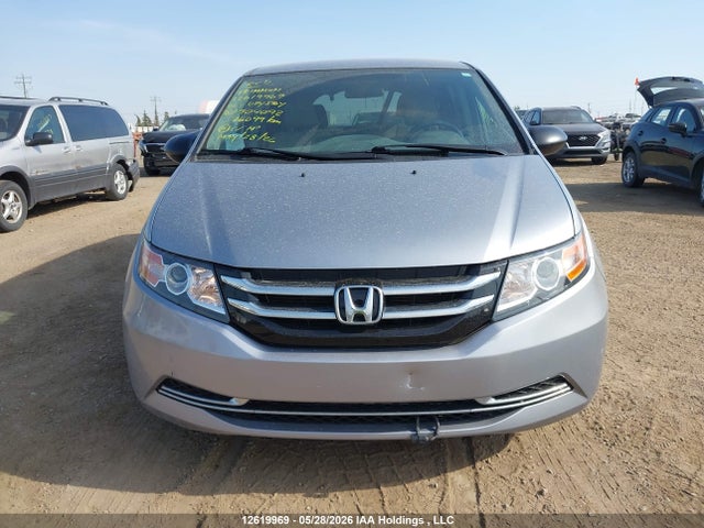 12619969 :رقم المزاد ، 5FNRL5H3XGB504092 vin ، 2016 Honda Odyssey Se مزاد بيع