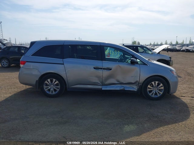 12619969 :رقم المزاد ، 5FNRL5H3XGB504092 vin ، 2016 Honda Odyssey Se مزاد بيع