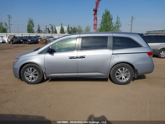 12619969 :رقم المزاد ، 5FNRL5H3XGB504092 vin ، 2016 Honda Odyssey Se مزاد بيع