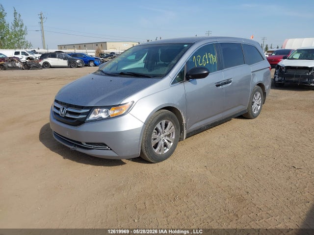 12619969 :رقم المزاد ، 5FNRL5H3XGB504092 vin ، 2016 Honda Odyssey Se مزاد بيع