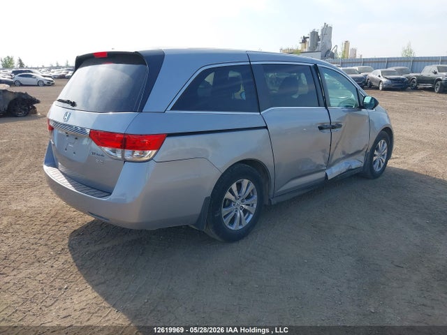 12619969 :رقم المزاد ، 5FNRL5H3XGB504092 vin ، 2016 Honda Odyssey Se مزاد بيع