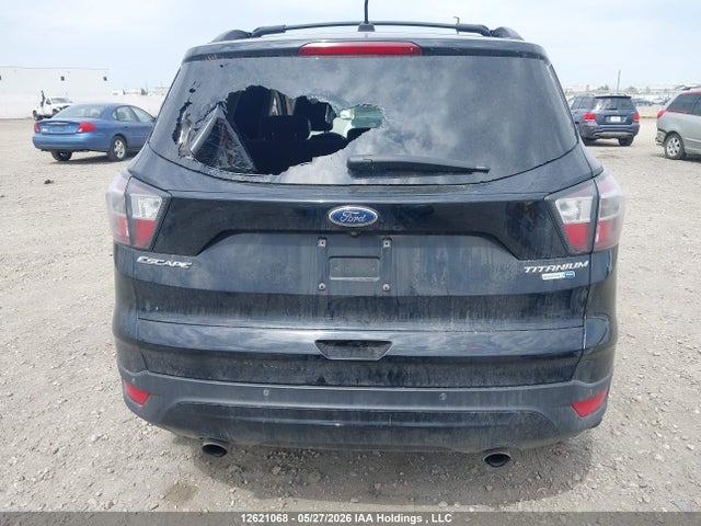12621068 :رقم المزاد ، 1FMCU9J99HUA34571 vin ، 2017 Ford Escape Titanium مزاد بيع