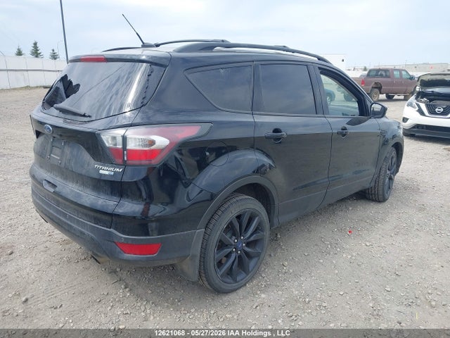 12621068 :رقم المزاد ، 1FMCU9J99HUA34571 vin ، 2017 Ford Escape Titanium مزاد بيع