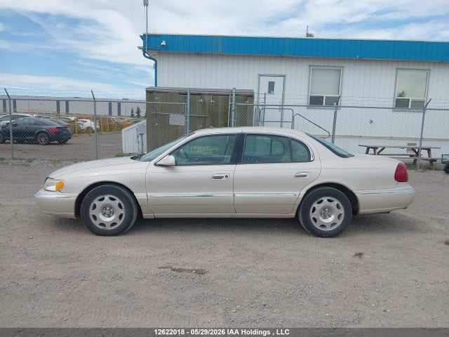 12622018 :رقم المزاد ، 1LNHM97V4XY640104 vin ، 1999 Lincoln Continental مزاد بيع