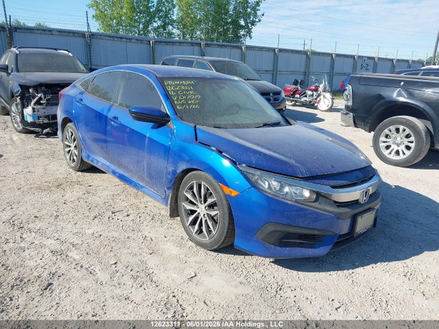 Продажа на аукционе авто 2016 Honda Civic Lx, vin: 2HGFC2E50GH017079, номер лота: 12623311