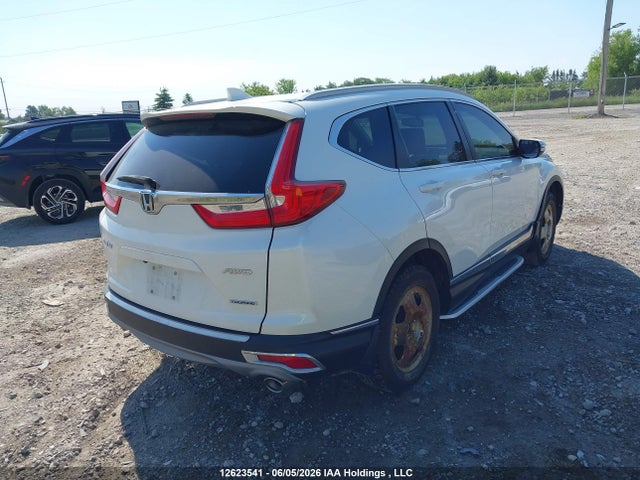 2018 Honda Cr-v Touring მანქანა იყიდება აუქციონზე, vin: 2HKRW2H95JH134169, აუქციონის ნომერი: 12623541