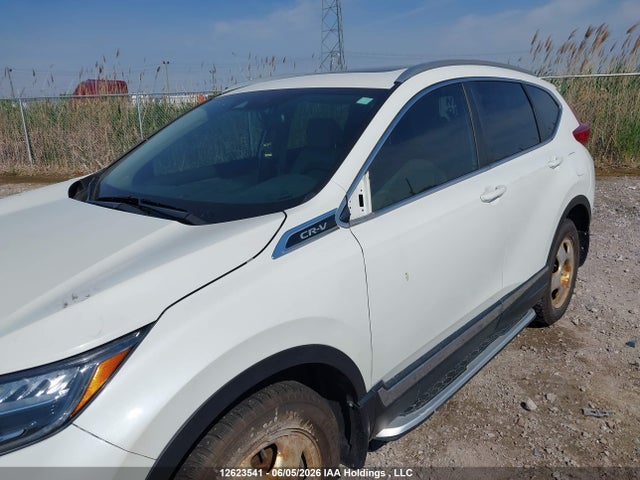 2018 Honda Cr-v Touring მანქანა იყიდება აუქციონზე, vin: 2HKRW2H95JH134169, აუქციონის ნომერი: 12623541