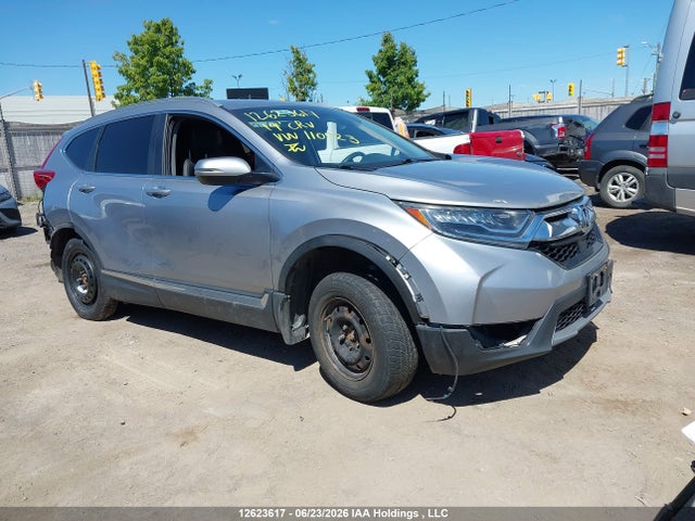 12623617 :رقم المزاد ، 2HKRW2H91KH110923 vin ، 2019 Honda Cr-v Touring مزاد بيع