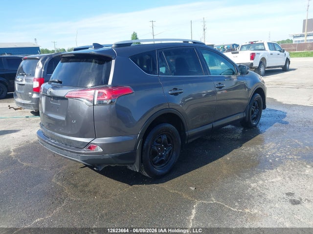 2T3ZFREV1GW306774 Toyota RAV4 LE