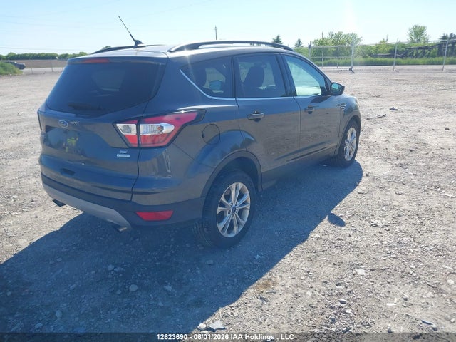 Продажа на аукционе авто 2018 Ford Escape Se, vin: 1FMCU0GD4JUC92221, номер лота: 12623690