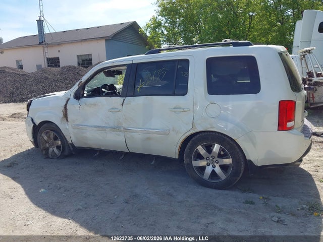 Продажа на аукционе авто 2012 Honda Pilot Touring, vin: 5FNYF4H99CB506234, номер лота: 12623735