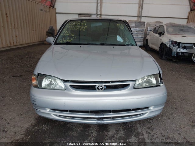 12623773 :رقم المزاد ، 2T1BR12E4XC750028 vin ، 1999 Toyota Corolla Ce/le مزاد بيع
