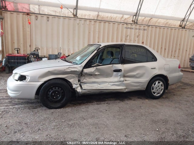 12623773 :رقم المزاد ، 2T1BR12E4XC750028 vin ، 1999 Toyota Corolla Ce/le مزاد بيع