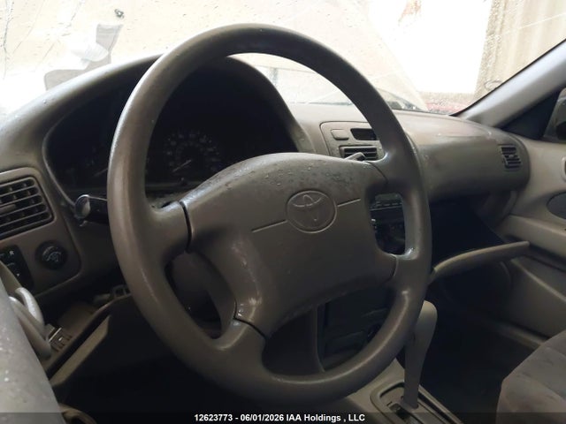 12623773 :رقم المزاد ، 2T1BR12E4XC750028 vin ، 1999 Toyota Corolla Ce/le مزاد بيع