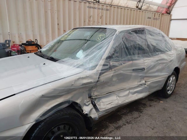12623773 :رقم المزاد ، 2T1BR12E4XC750028 vin ، 1999 Toyota Corolla Ce/le مزاد بيع