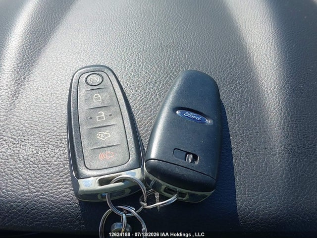 12624188 :رقم المزاد ، 1FADP3J25EL385467 vin ، 2014 Ford Focus Titanium مزاد بيع