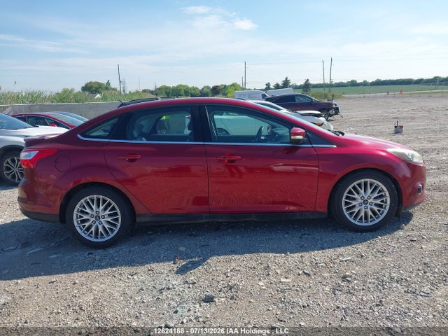 12624188 :رقم المزاد ، 1FADP3J25EL385467 vin ، 2014 Ford Focus Titanium مزاد بيع